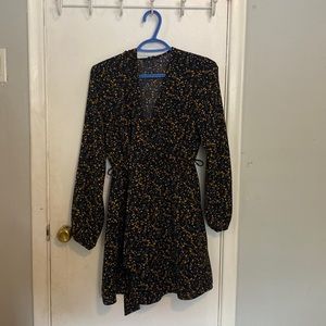 Black and gold mini dress